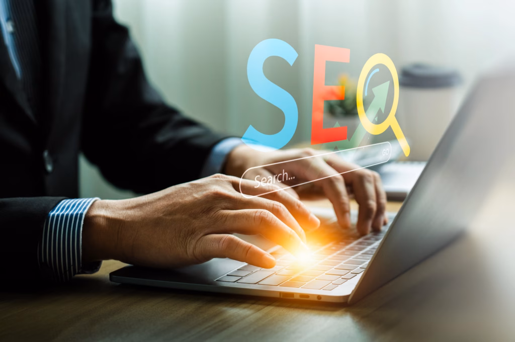 A person in a business suit types on a laptop, with the word SEO and a magnifying glass graphic digitally overlaid, symbolizing search engine optimization and the decision to hire SEO experts for enhanced online searching. - Lead Experts